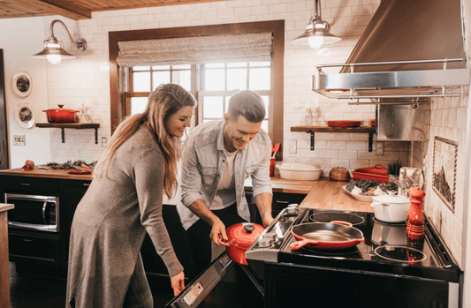 Couple-cooking-with-pepper-jelly