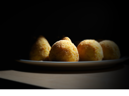 Pepper jelly adds some sweet heat to this arancini recipe