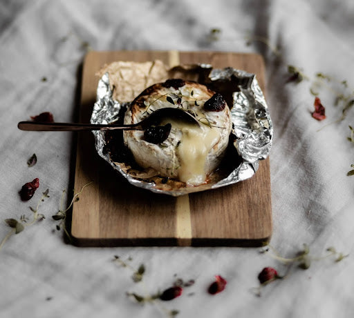 Close-up of baked brie cheese fresh out of the oven