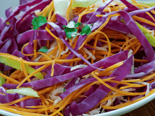 A close-up of freshly made coleslaw