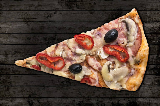 A slice of pizza topped with tomatoes, olives, mushrooms, and a variety of meats