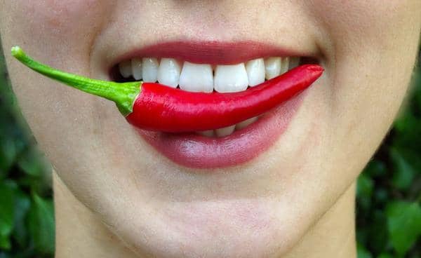 Woman eating spicy food